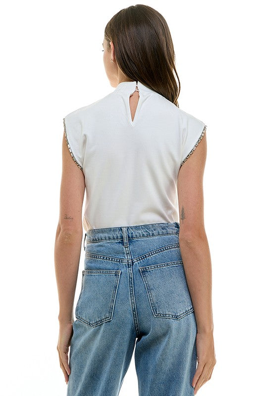 Sleek Sleeveless Turtleneck Tee With Silver Trim